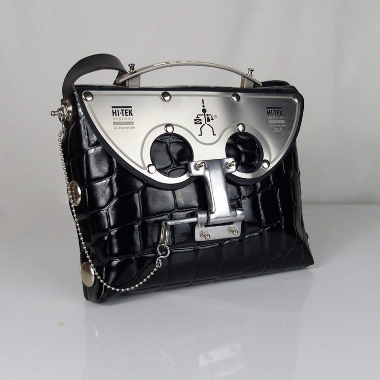 black shiny leather cross body bag, statement bag, futuristic, sci fi unusual unique