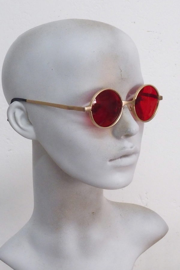 gold sunglasses red lens