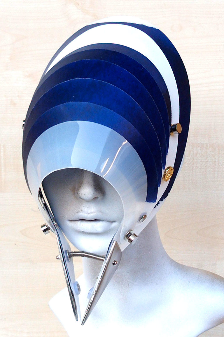 futuristic head wear in entertainment article, wearable art, cobalt blue white