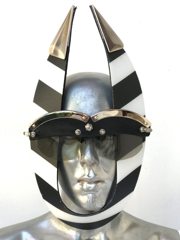 black and white stripe mask with triangular horns metal components, styling video, Burning Man