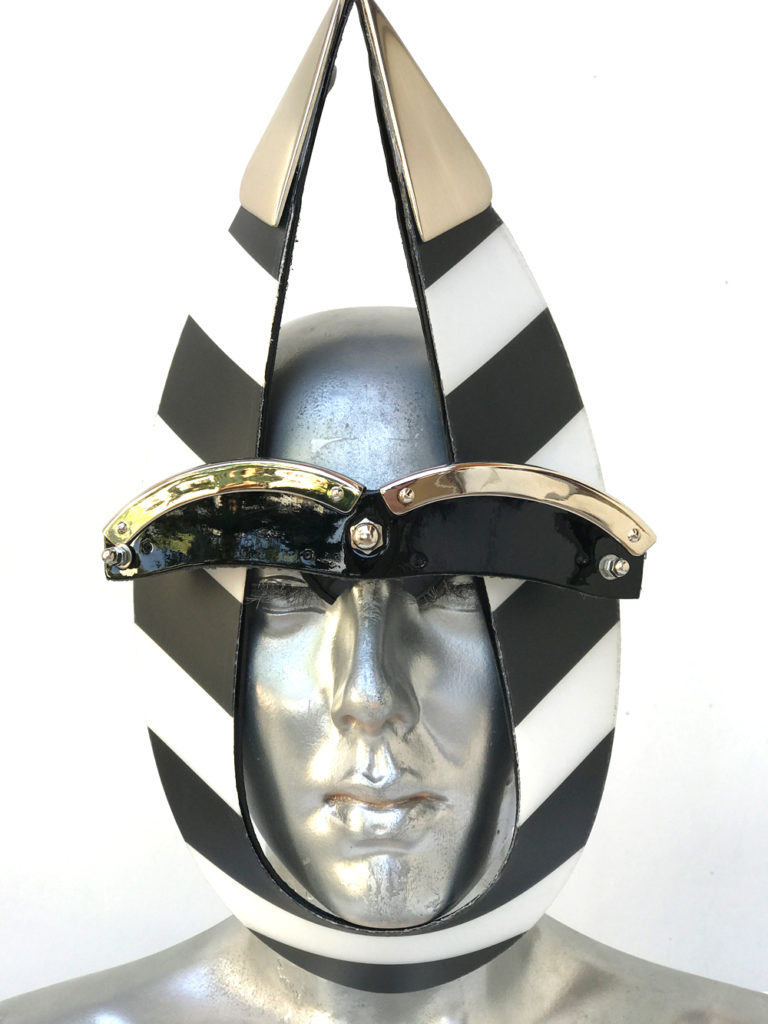 black and white stripe mask with triangular horns metal components, styling video, Burning Man