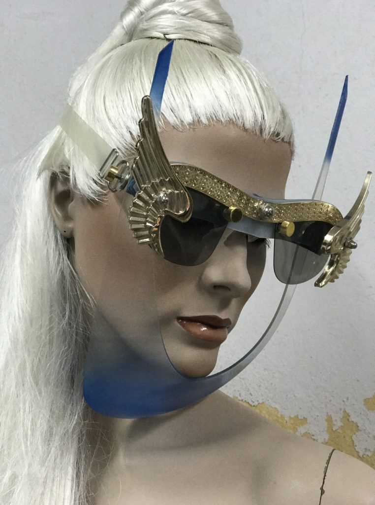 mask with wings, blue mask gold angel wings, unusual, video, styling, filming