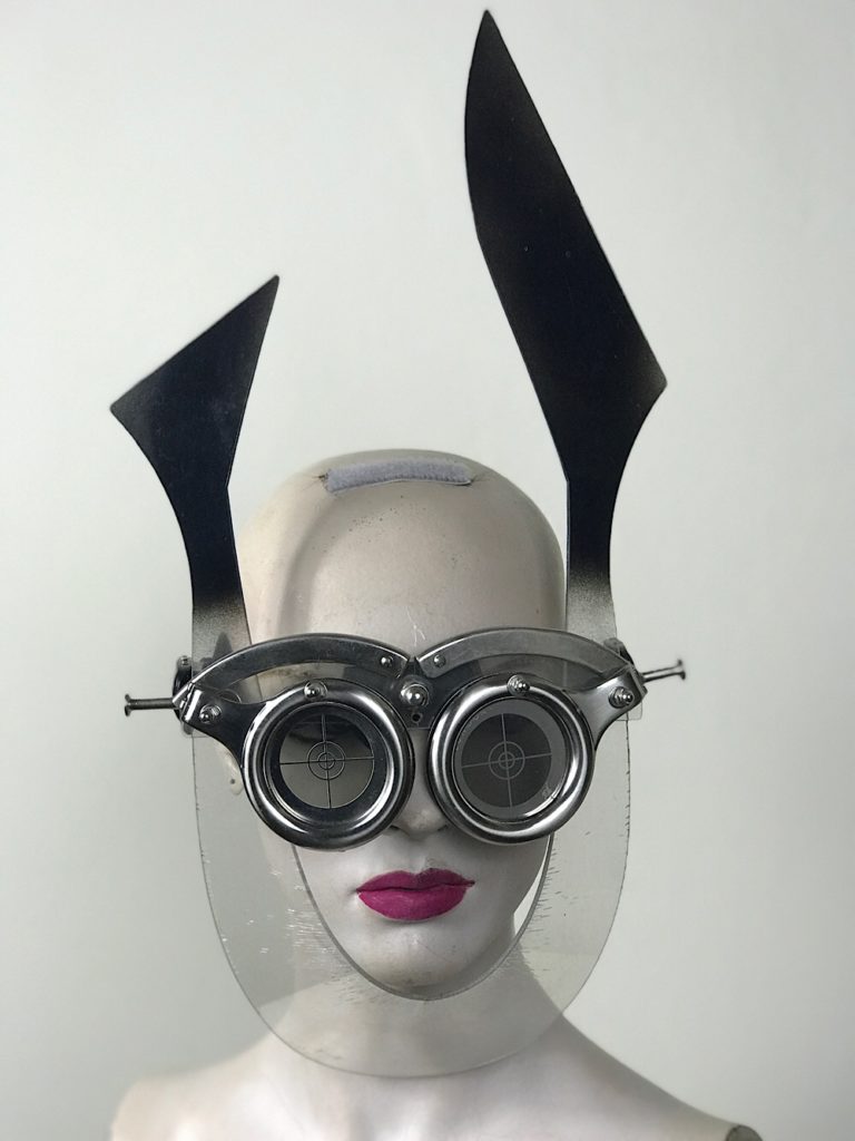 eye wear mask with horns and perforated metal oculars lenses Hi Tek