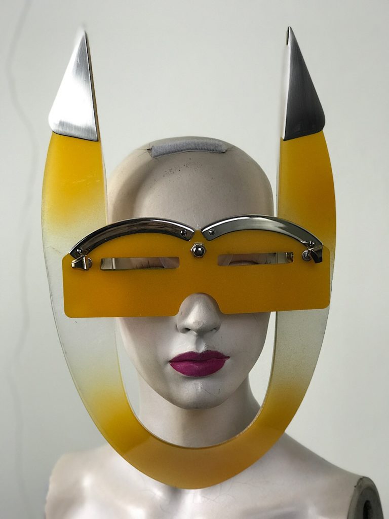 mask with horns, styling video, costume yellow