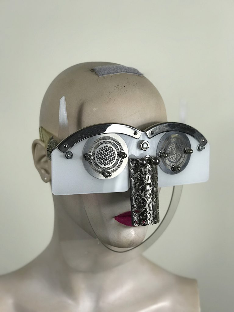 white eyewear mask with horns metal nose shield perforated metal ocular lens Hi Tek