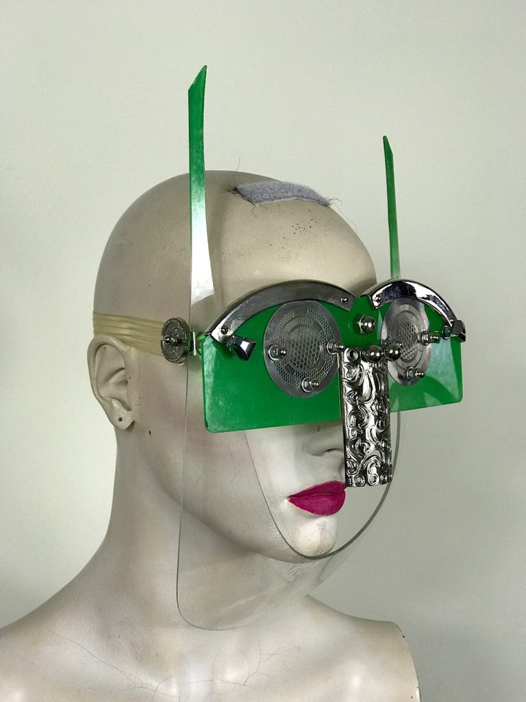 green  eyewear mask with horns metal nose shield perforated metal ocular lens Hi Tek