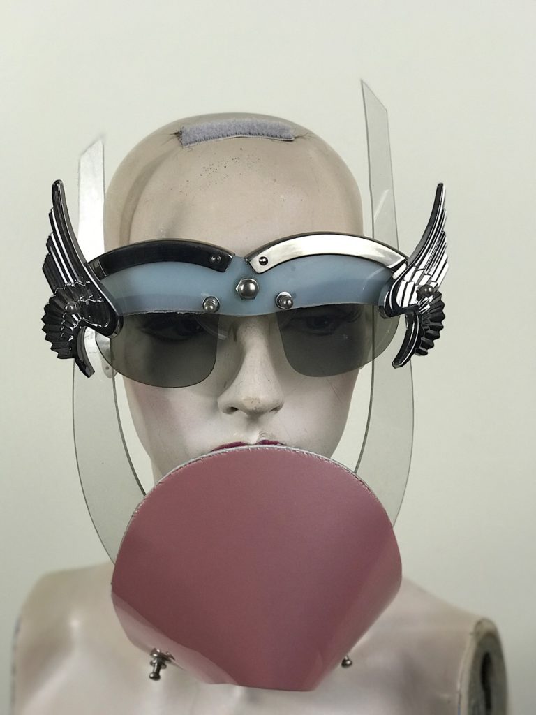 Eye wear mask with metal wings and pink muzzle